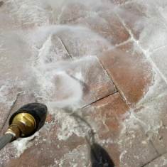 2 close up image of power washing brick overlay