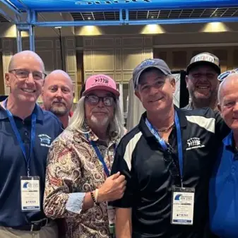 a group of people at a convention center