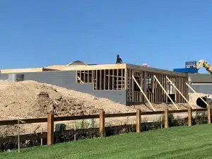 999999999.20230315193638407.999999999.20230315193638407yGfRN building being put together with wood slabs and concrete